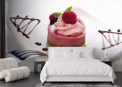 Delicious raspberry cheesecake served with berries Wall mural