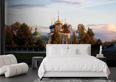 Beautiful city Tver landscape view of imperial palace at sunset on river Volga embankment with garden trees, dramatic sunset sky and russian buildings. Small city architecture concept. Tver, Russia.
 Wall mural