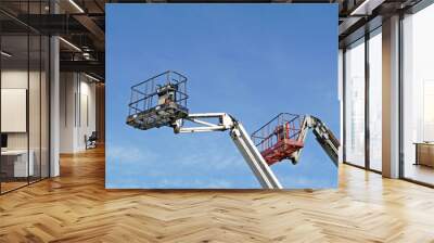 Two hydraulic lift platforms Wall mural