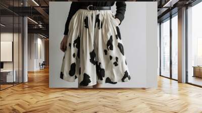 Fashionable Woman in Trendy Black and White Skirt Wall mural