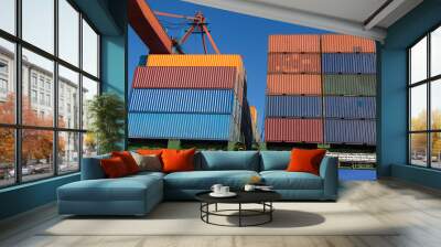 Container Ship is loading in a port Wall mural