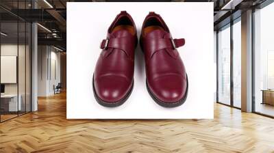 A pair of burgundy single monk strap shoes isolated on white background. Versatile business casual dress shoes without laces. Top view, copy space for text, flat lay. Wall mural