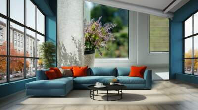 Image of window with a flower in a pot and curtain in the room. Wall mural