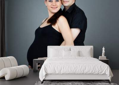 portrait of a happy pregnant couple. young pregnant couple. happ Wall mural