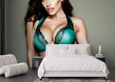 Pretty young female  posing in sexy green lingerie.  Beautiful young woman Wall mural