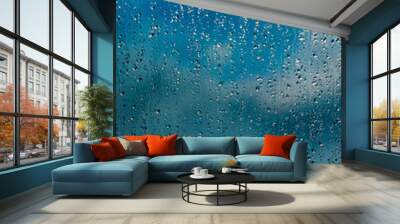 rain drops on window blue background Wall mural