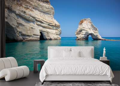 Rock formations and sea caves at Kleftiko shoreline in Milos, Greece Wall mural