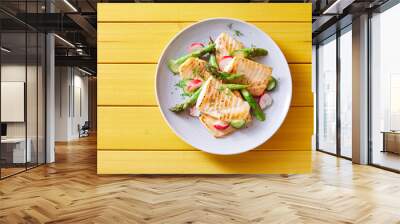 Delicious fish fillet and fresh vegetables served for lunch Wall mural