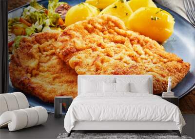 Pieces of Wiener schnitzel with potatoes Wall mural