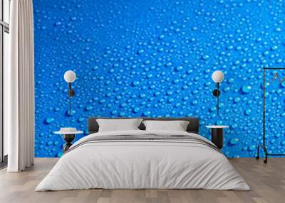 shiny blue smooth surface covered with dew drops Wall mural