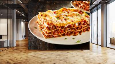 Tasty lasagne served on plate Wall mural