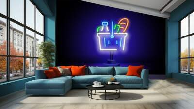 Neon Grocery Cart. Basket with vegetables, fruits, milk and bread. Concept for Grocery Store, Consumer Basket. Glowing neon sign on a dark background. Wall mural