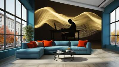 A silhouette of a person sitting at a desk with abstract waves of light surrounding them, creativity, purpose, and satisfaction in one's work Wall mural