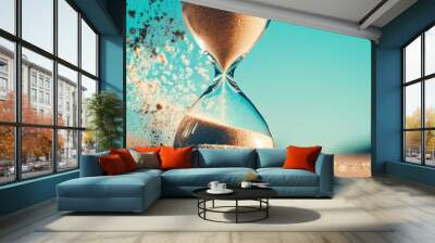 An hourglass where the sand transforms into abstract symbols representing innovation and progress as it falls, symbolizing the role of time and strategy in managing change Wall mural