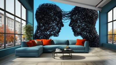 Two abstract human figures facing away from each other, their torsos connected by tangled wires or chains, representing an inescapable conflict of interests Wall mural