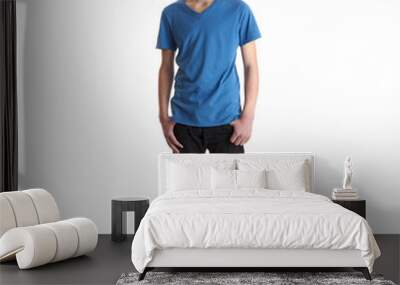 Cute teenager boy over white isolated background Wall mural