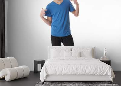 cute teenager boy over white isolated background Wall mural