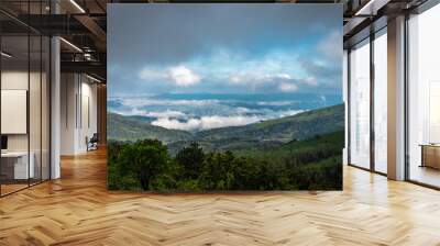 mountain coverd with cloud layers and beautiful sky Wall mural