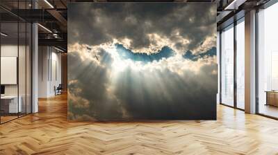 sun rays through cloud patch at day dramatic scene Wall mural