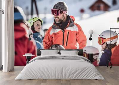 A ski instructor guides a group of students down the slope. Wall mural