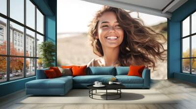 She flashes a bright smile, radiating happiness. Wall mural