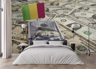 Flag of Mali sticking in various american banknotes.(series) Wall mural