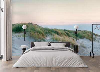 Panoramic view of a lighthouse standing at the coast of Sylt, North Sea, Germany Wall mural