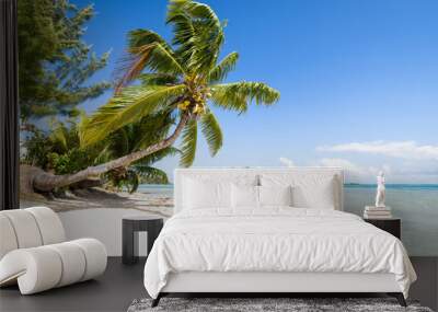 Summer vacation on a tropical island with beautiful sandy beach and palm tree Wall mural