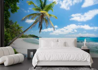 Tropical beach with palm tree Wall mural