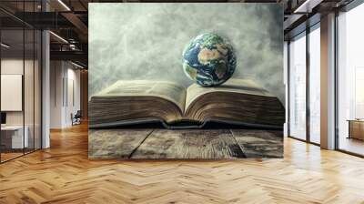 A world emerging from the pages of an open book, World from a book theme, Imaginative style Wall mural