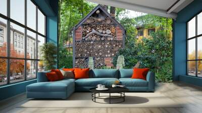 a house made of natural materials,a pile of wood,in the forest, organic and natural, environmentally friendly Wall mural