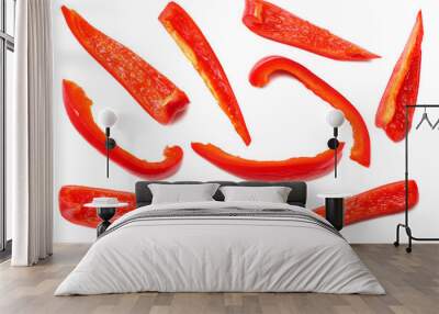 cut slices of red sweet bell pepper isolated on white background top view Wall mural