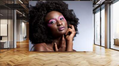  Afro and Flower beauty with big black hair smooth dark skin  does stunning poses for studio photography shoot  Wall mural