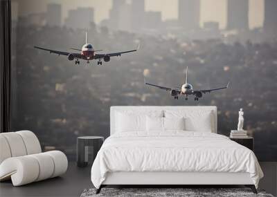 Aerial view of two airplanes, one large and one small, flying in formation with a cityscape below, symbolizing a successful airline acquisition and strategic partnership Wall mural