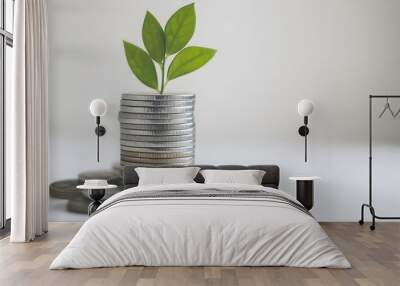 Green plant growing from a stack of gold coins, symbolizing financial growth, sustainability, and investment, isolated on a white background, ideal for economic and ecological concepts Wall mural