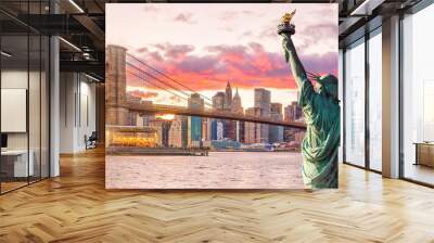 Statue Liberty and  New York city skyline at sunset Wall mural