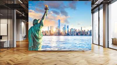 Statue Liberty and  New York city skyline at sunset Wall mural