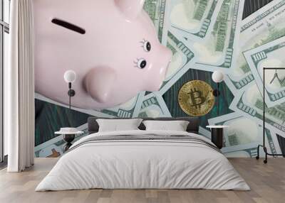 Piggy bank in the form of a pig. Nearby are dollar bills and bitcoin. Wall mural