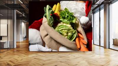 Santa Claus with a bag full of vegetables and fruits Wall mural