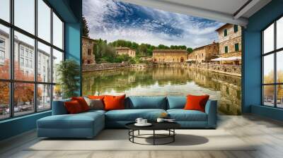 old thermal baths in the medieval village bagno vignoni, tuscany, italy/ spa basin in the antique it Wall mural