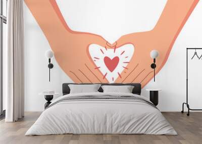 Hands holding a heart. Symbol of volunteer or charity organisations. Wall mural