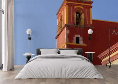 beautiful orange catholic church bell tower Wall mural