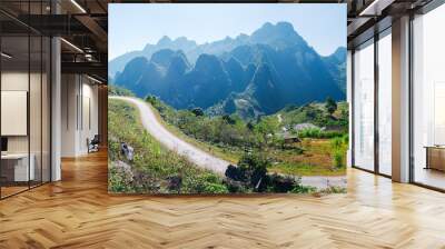 Ha Giang karst geopark mountain landscape in North Vietnam. Winding road in stunning scenery. Ha Giang motorbike loop, famous travel destination bikers easy riders. Wall mural