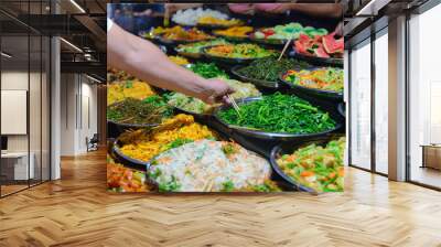 Street food in Luang Prabang, Laos. Delicious food stall selling colorful vegetable dishes to tourist. Asian cuisine, tasty food, healthy lifestyle. Wall mural