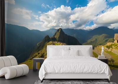 Sunlight on Machu Picchu, Peru, with llamas in foreground Wall mural