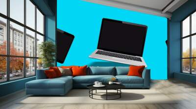 Flying laptop, mobile and tablet with blank screen isolated Wall mural