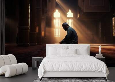 Muslim Man Praying Inside Mosque with Calm Atmosphere Wall mural