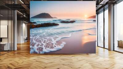 The tranquil beauty of a beach at dawn, where the first light of day bathes the landscape in soft hues Wall mural