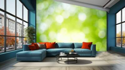 beautiful abstract lights of green nature using as background or wallpaper concept. Wall mural