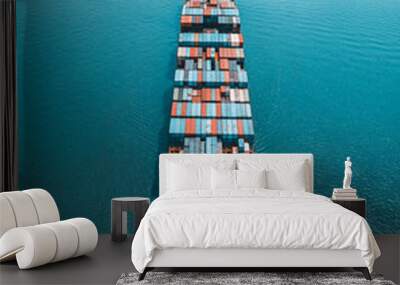 Container ship carries cargo, goods, and materials from one port to another for supplying purpose. Wall mural